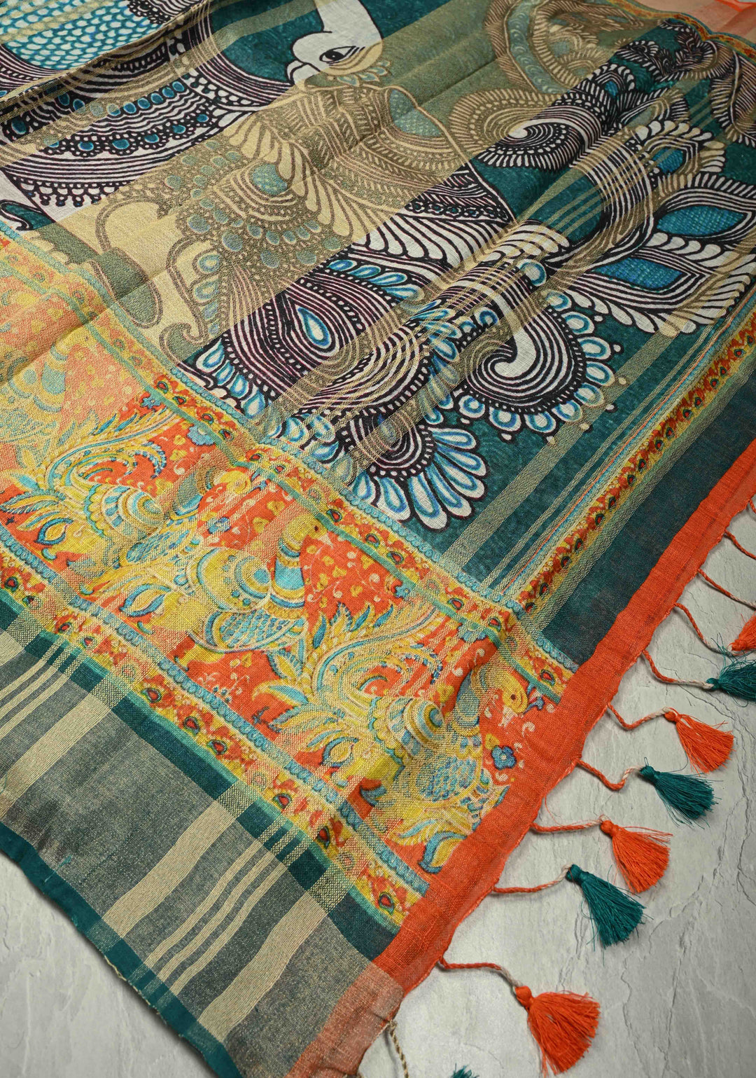 Teal Kalamkari Digital Print on Linen Saree with Peacock Motifs on Pallu and Ganga Jamuna Tissue Border