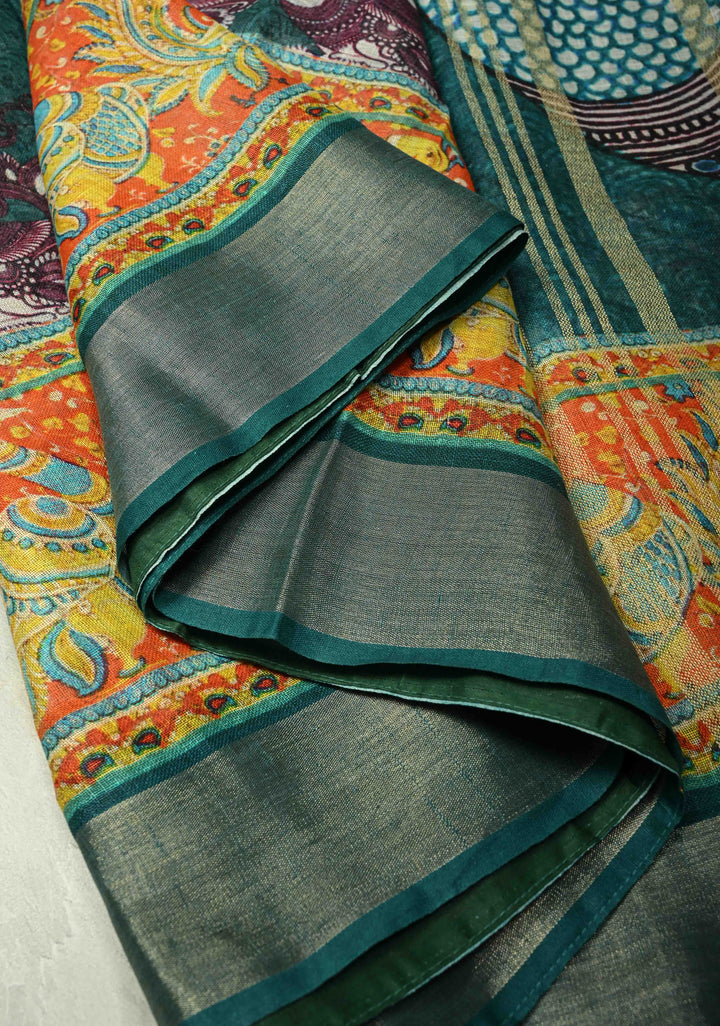 Teal Kalamkari Digital Print on Linen Saree with Peacock Motifs on Pallu and Ganga Jamuna Tissue Border