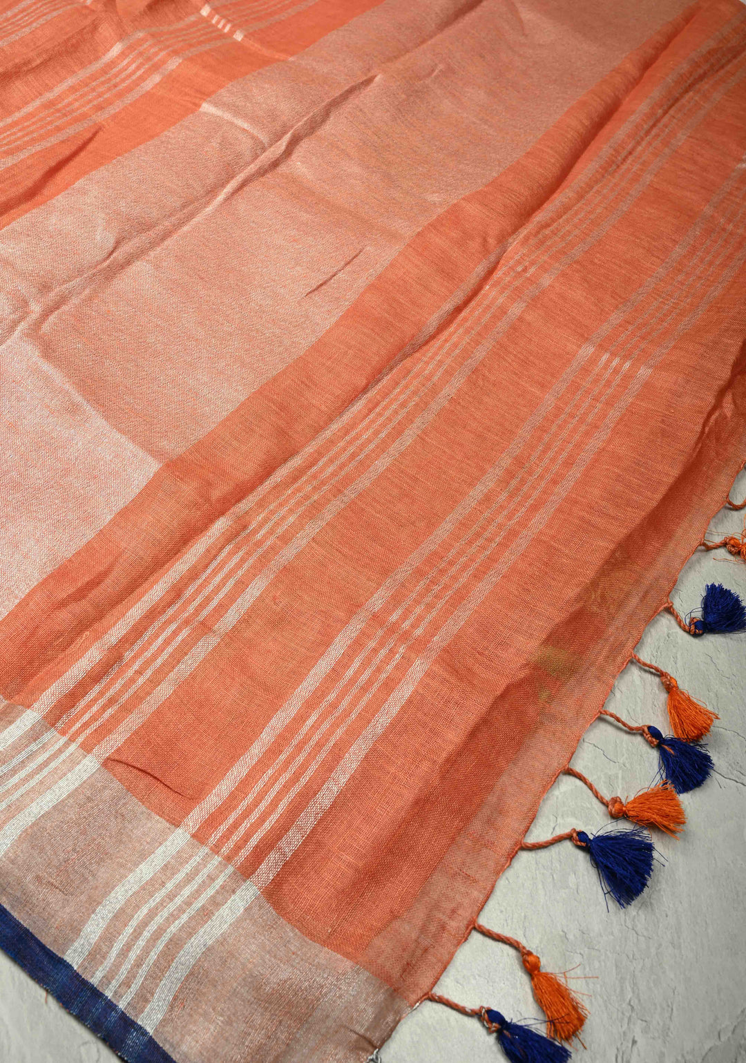 Dark Peach Linen Saree with Botanical Machine Embroidery and Tissue Zari Border