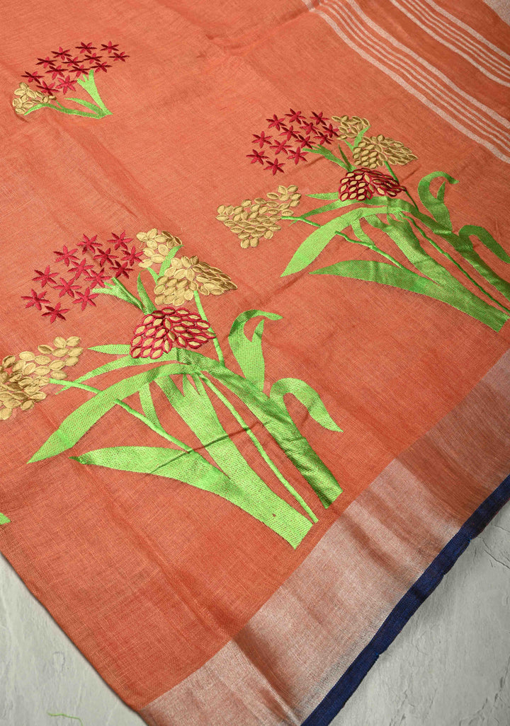 Dark Peach Linen Saree with Botanical Machine Embroidery and Tissue Zari Border