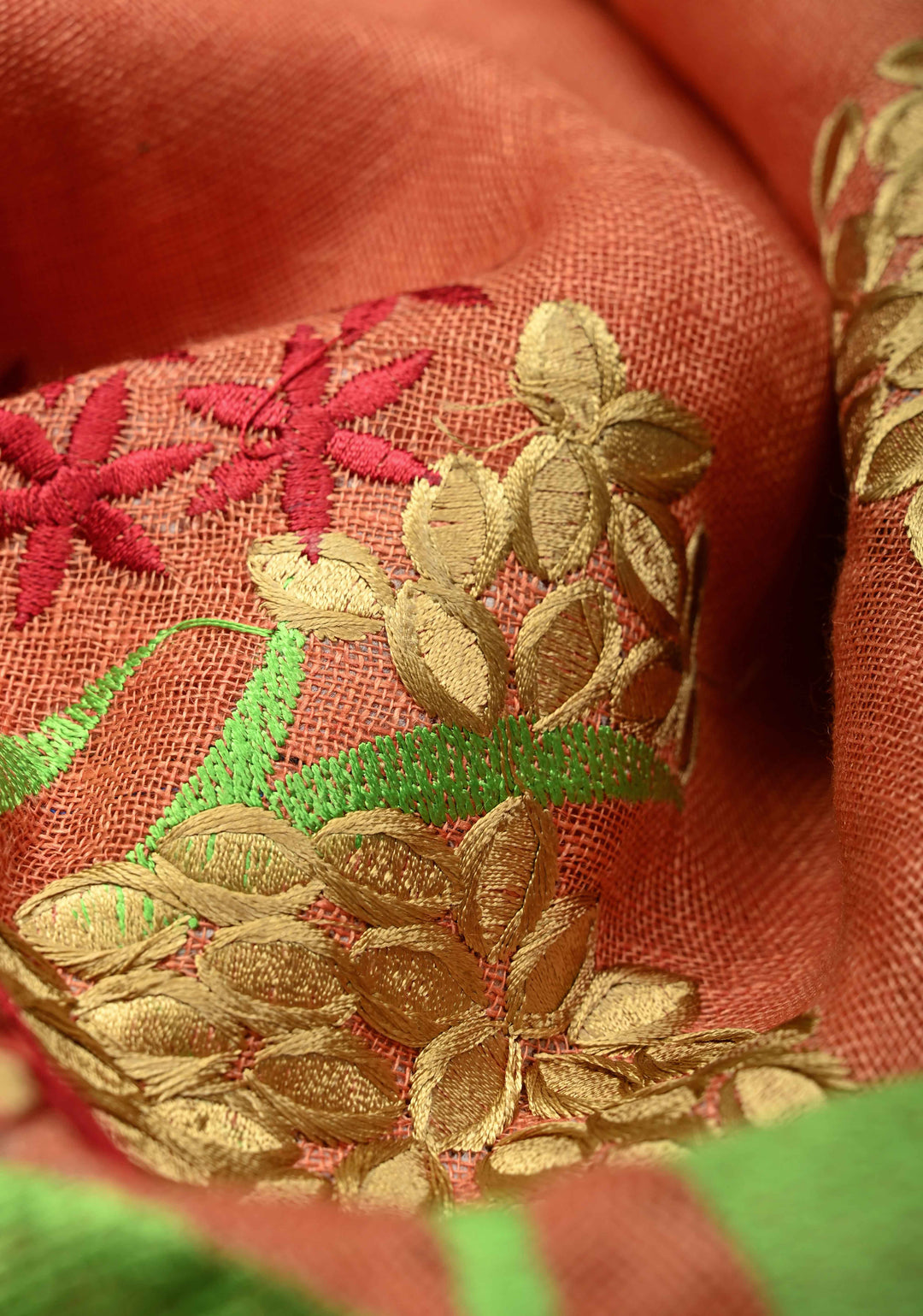 Dark Peach Linen Saree with Botanical Machine Embroidery and Tissue Zari Border
