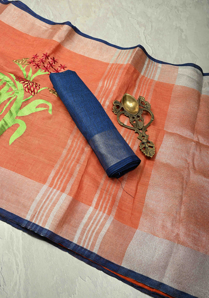 Dark Peach Linen Saree with Botanical Machine Embroidery and Tissue Zari Border