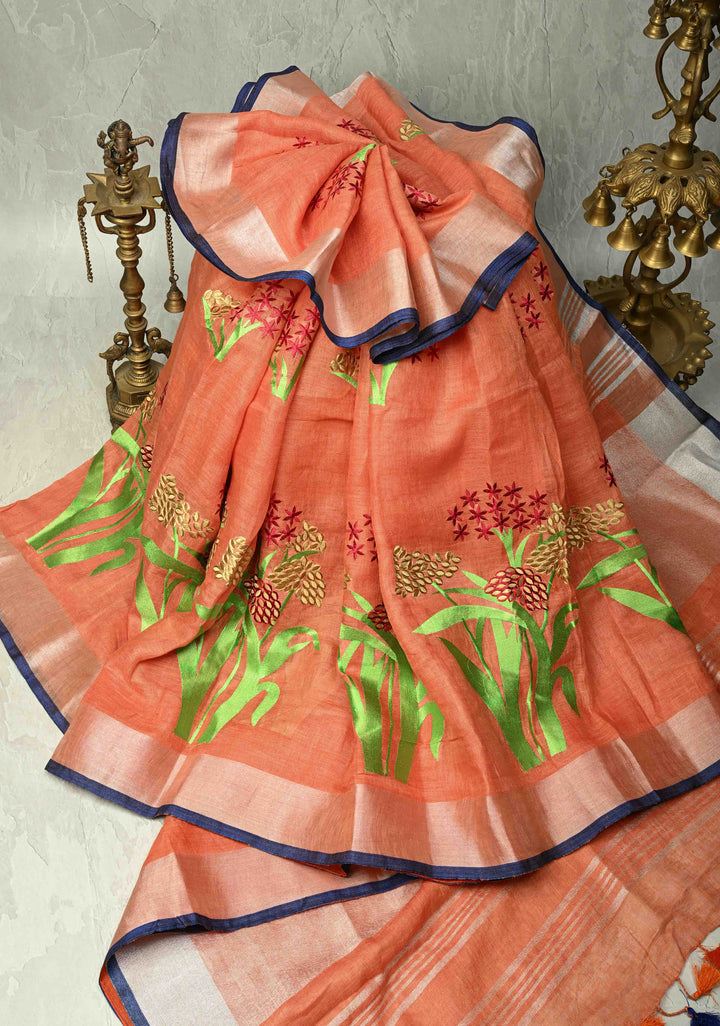 Dark Peach Linen Saree with Botanical Machine Embroidery and Tissue Zari Border