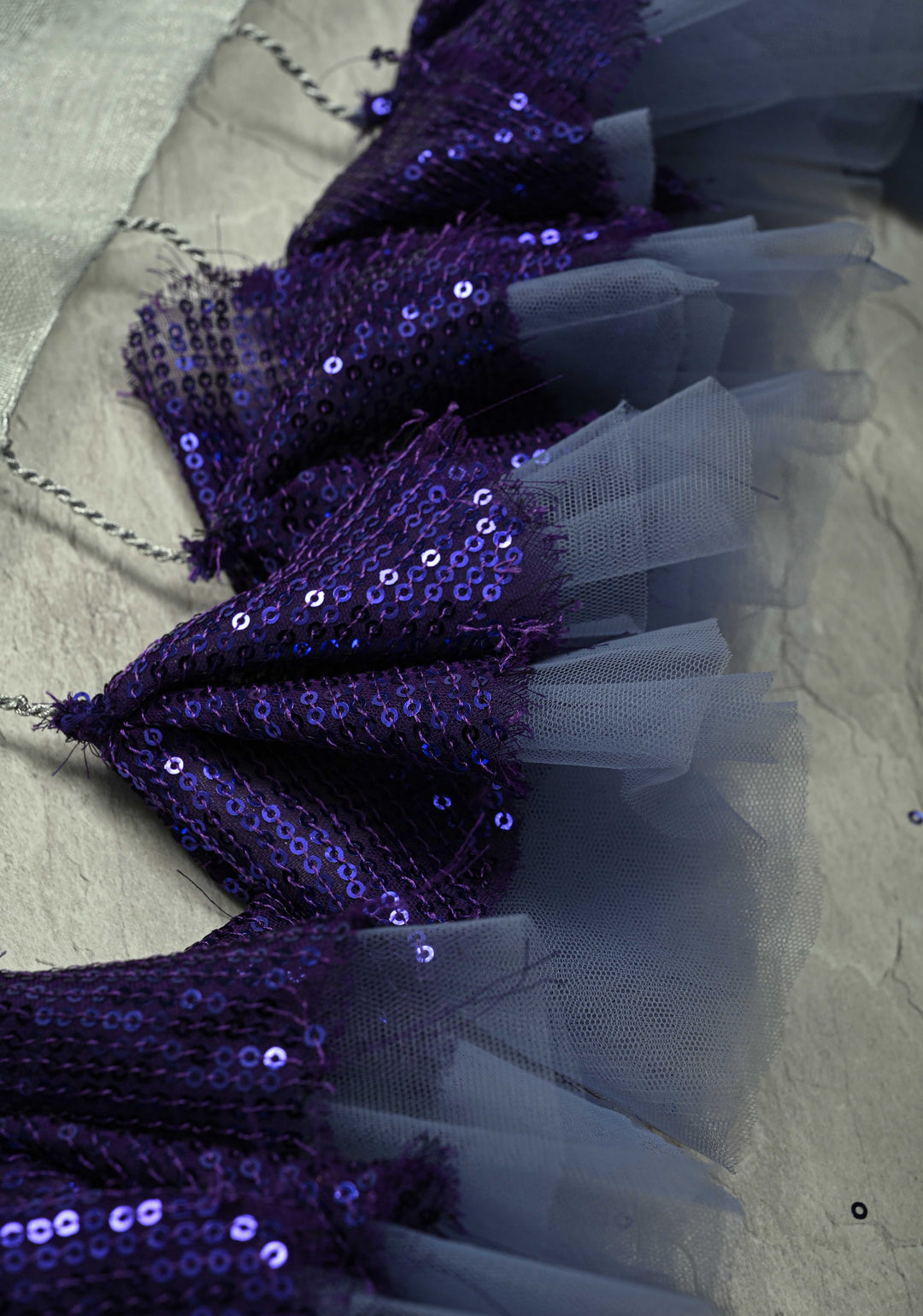 Cutwork and Mirror Work Tissue Linen Saree in Silver with Dramatic Fancy net Tassels