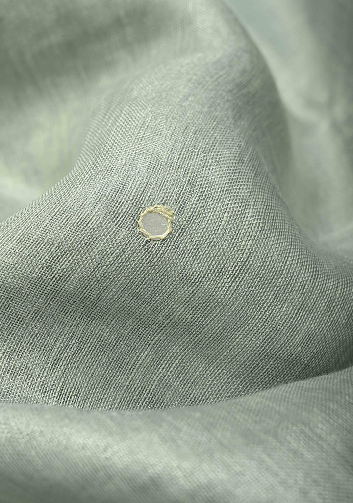 Cutwork and Mirror Work Tissue Linen Saree in Silver with Dramatic Fancy net Tassels