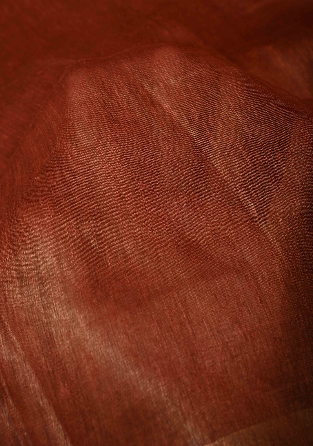 Copper Rust Silk Linen Saree with Muted Tissue Border and Floral Buttas on Pallu | SHOBITAM