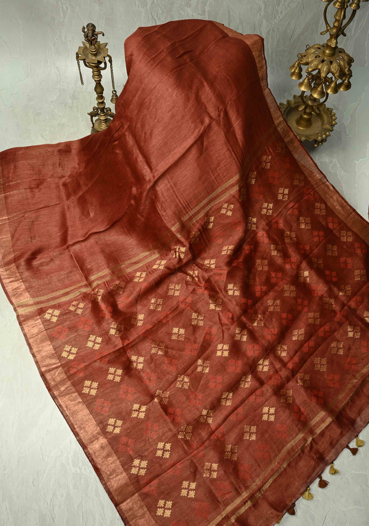 Copper Rust Silk Linen Saree with Muted Tissue Border and Floral Buttas on Pallu | SHOBITAM