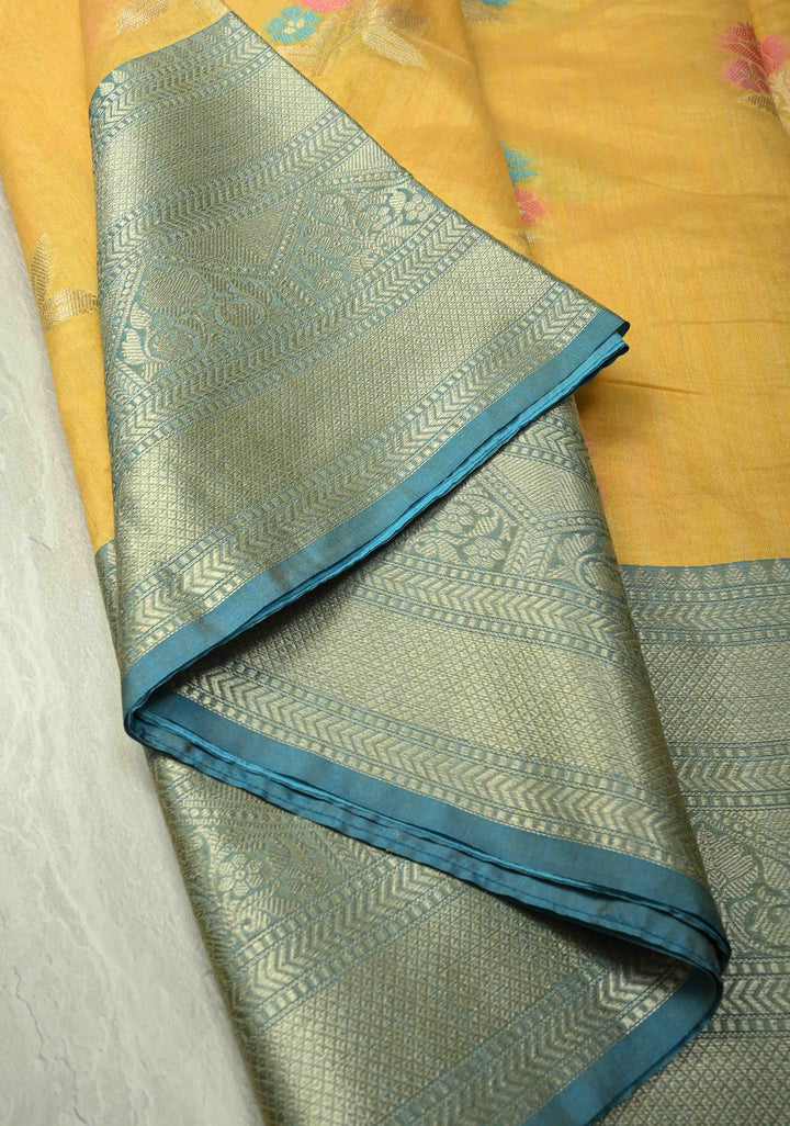 Mango Yellow Banarasi Semi Kora Saree with Meenakari Floral Buttas and Contrast Wide Zari Border | SHOBITAM