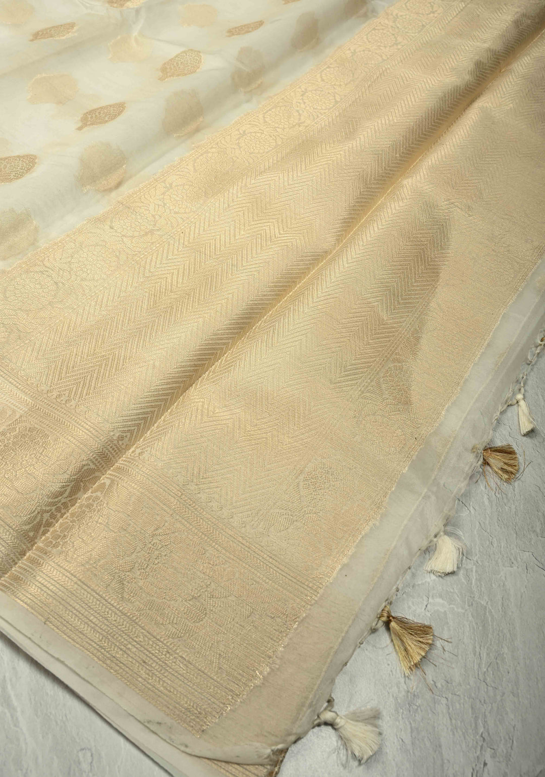 Ivory Banarasi Semi Kora Saree with Sona Rupa Buttas and Zari Border