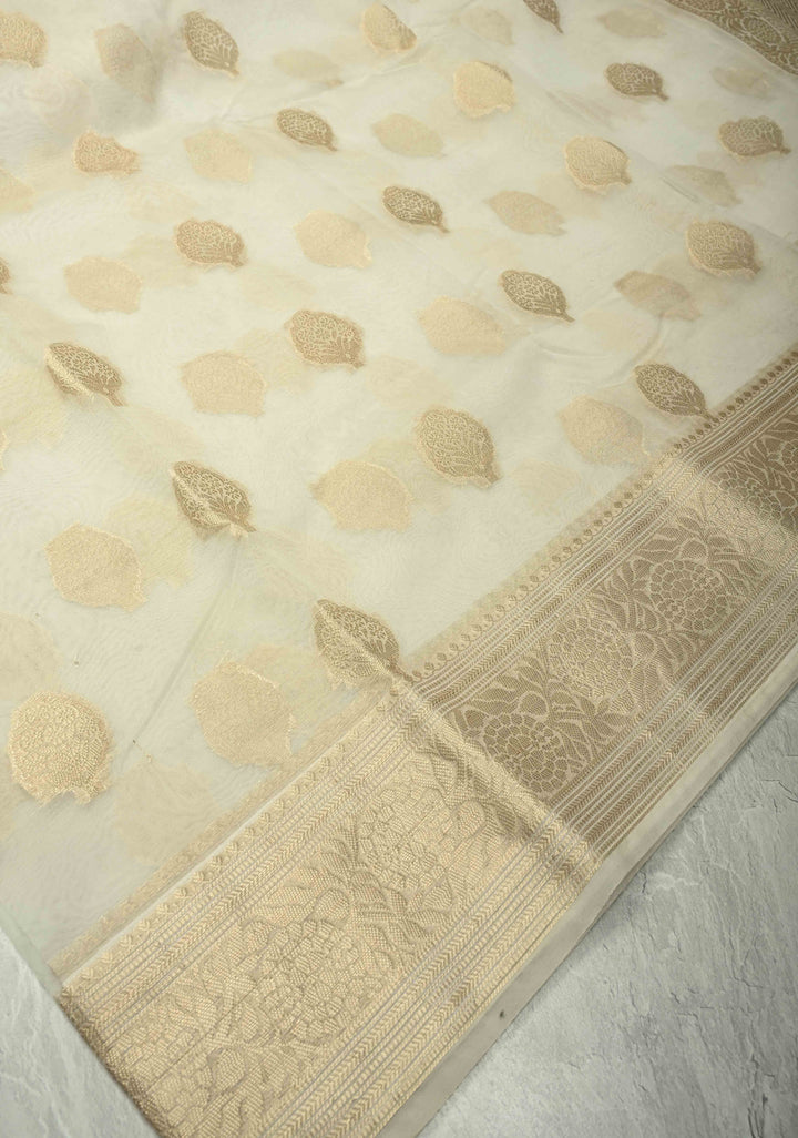 Ivory Banarasi Semi Kora Saree with Sona Rupa Buttas and Zari Border