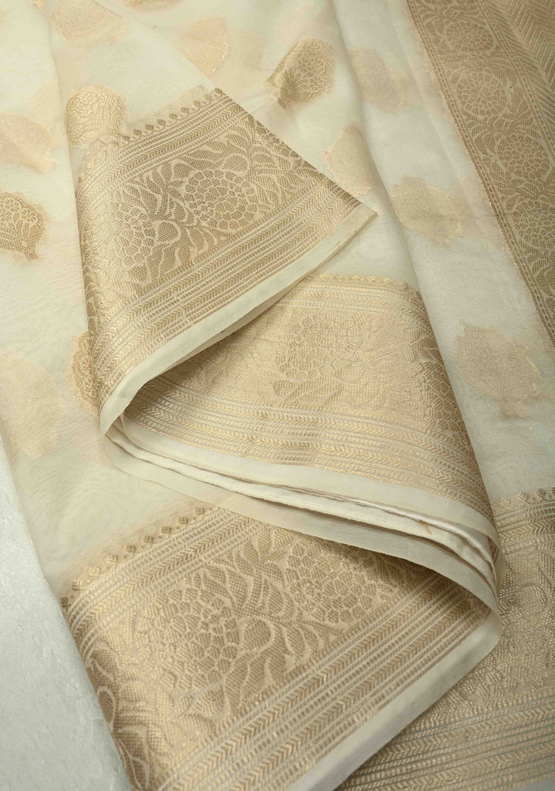 Ivory Banarasi Semi Kora Saree with Sona Rupa Buttas and Zari Border