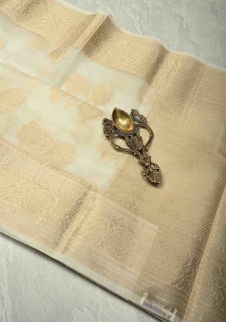 Ivory Banarasi Semi Kora Saree with Sona Rupa Buttas and Zari Border