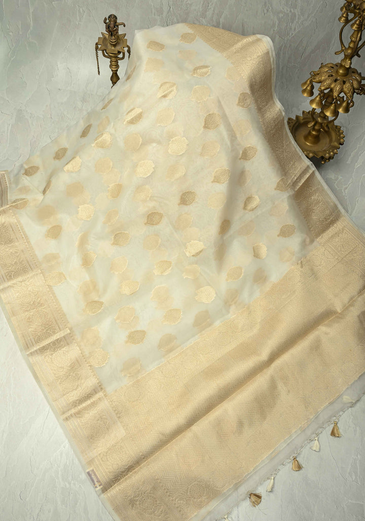 Ivory Banarasi Semi Kora Saree with Sona Rupa Buttas and Zari Border