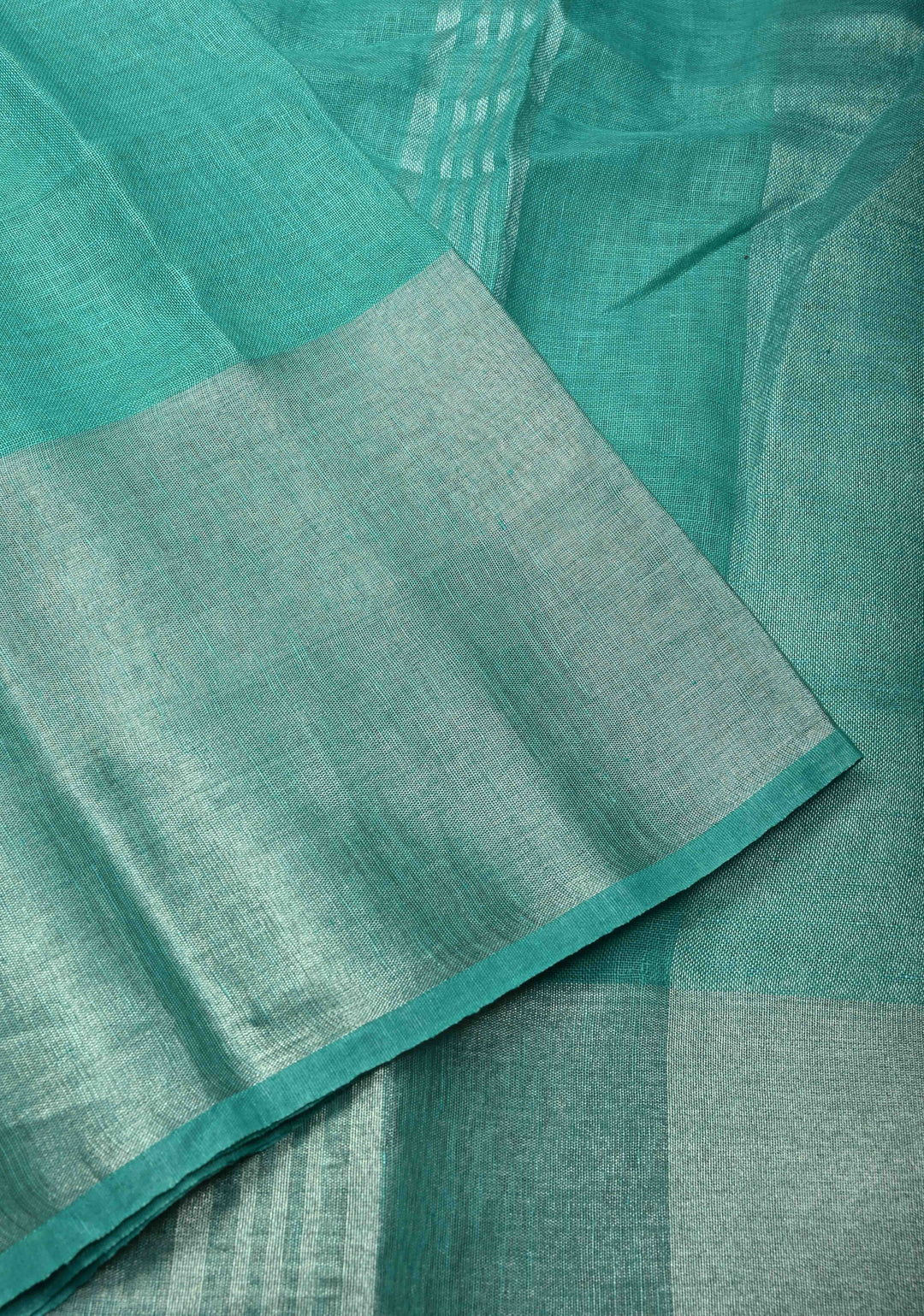 Turquoise Pure Linen by Linen Saree with Wide Zari Border | SHOBITAM