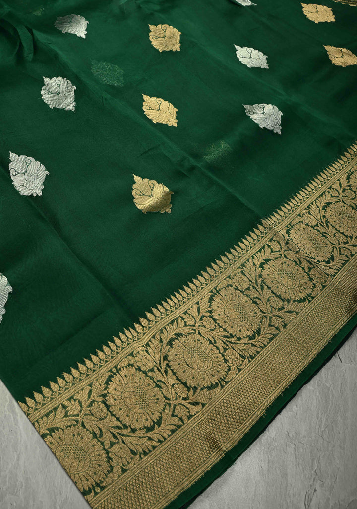 Bottle Green Banarasi Semi Kora Saree with Sona Rupa Buttas and Zari Border