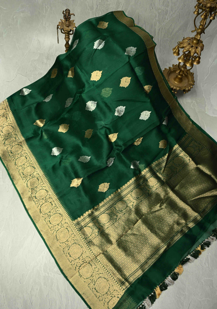 Bottle Green Banarasi Semi Kora Saree with Sona Rupa Buttas and Zari Border