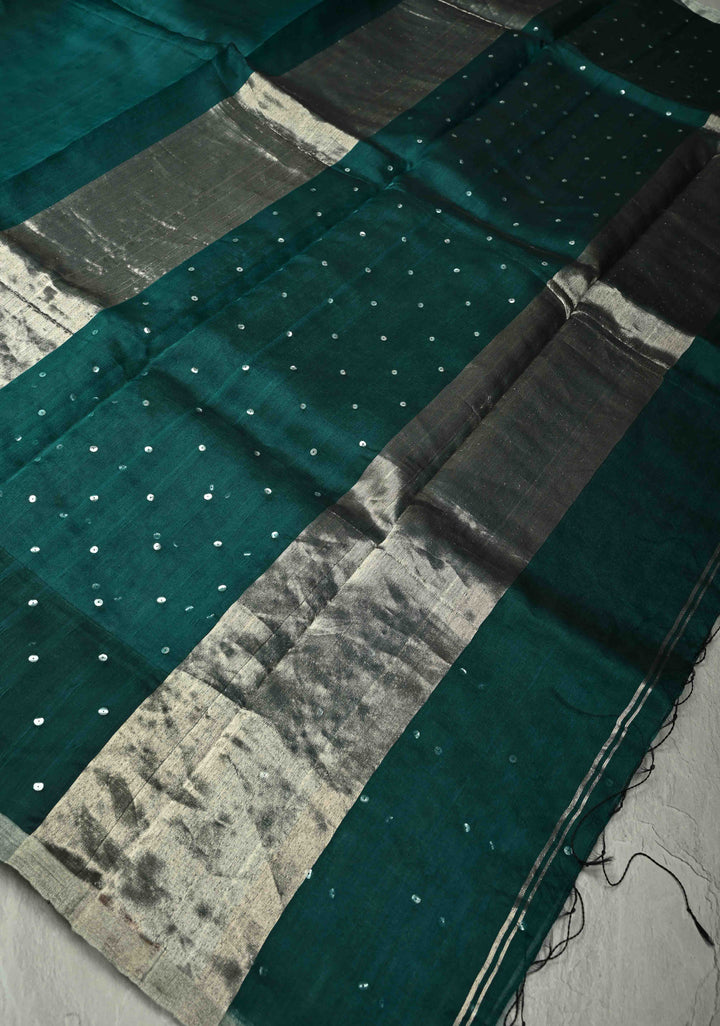Pocket Sequins Woven on Pure Matka Muslin Saree in Dark Teal and Minimal Zari Border