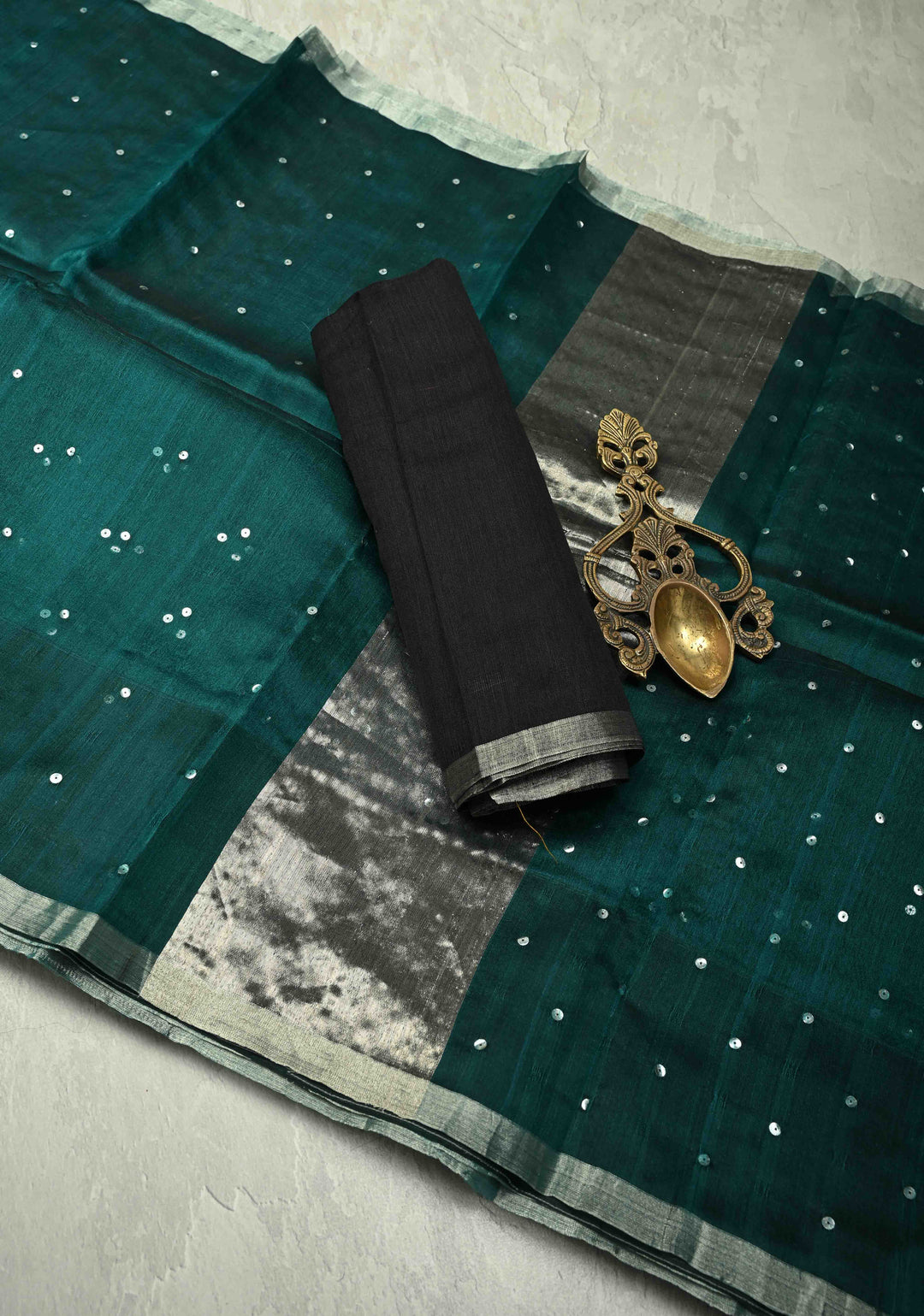 Pocket Sequins Woven on Pure Matka Muslin Saree in Dark Teal and Minimal Zari Border