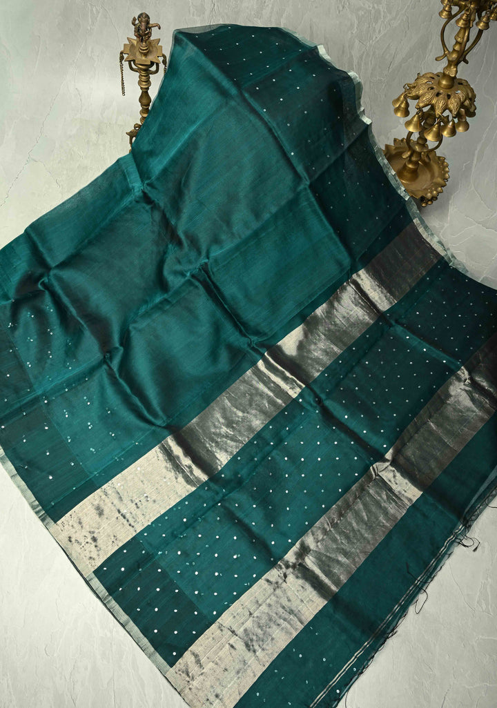 Pocket Sequins Woven on Pure Matka Muslin Saree in Dark Teal and Minimal Zari Border