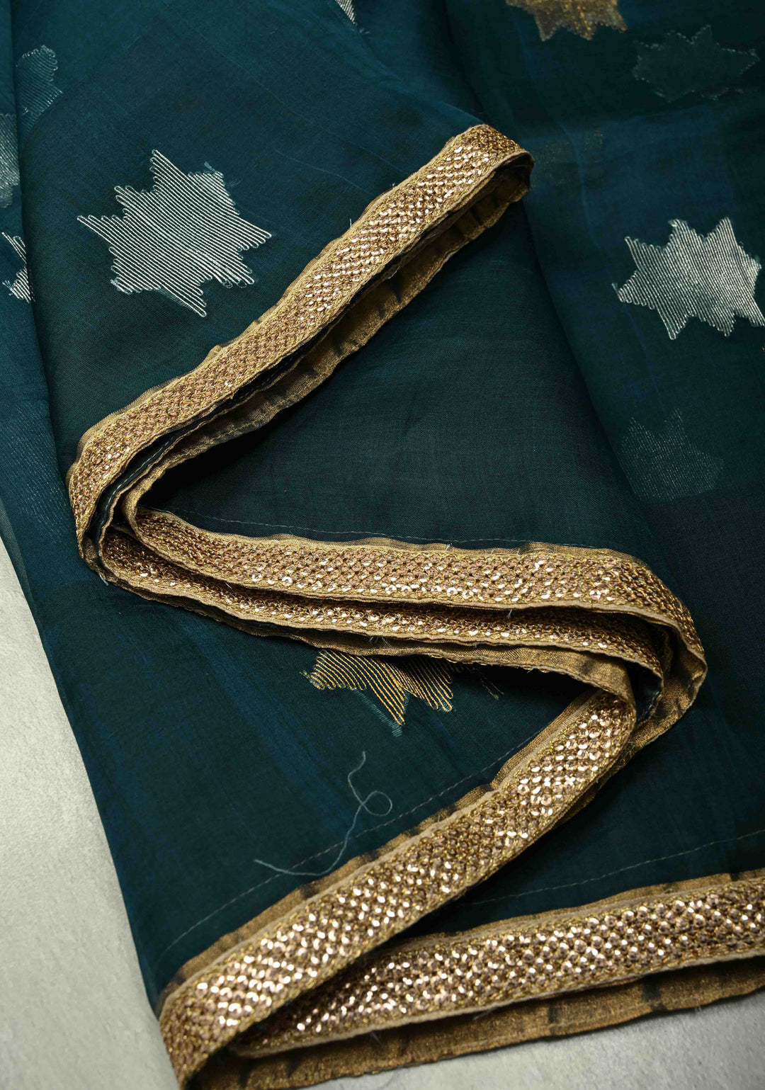 Dark Teal Muslin Jamdani Saree with Sona Rupa Buttas and Lace Border