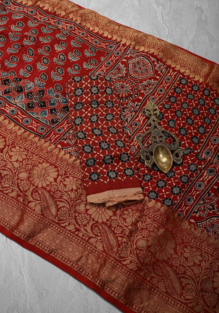 Ajrakh Hand Block Print on Modal Silk with woven Zari Borders and pallu in Red