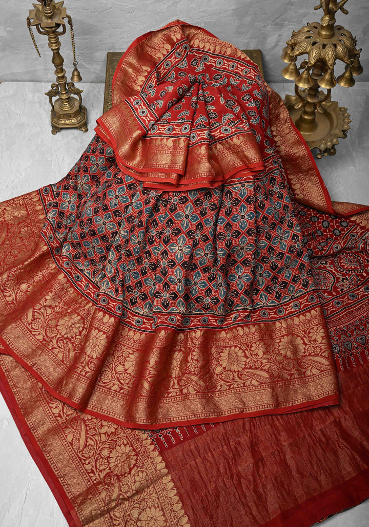 Ajrakh Hand Block Print on Modal Silk with woven Zari Borders and pallu in Red