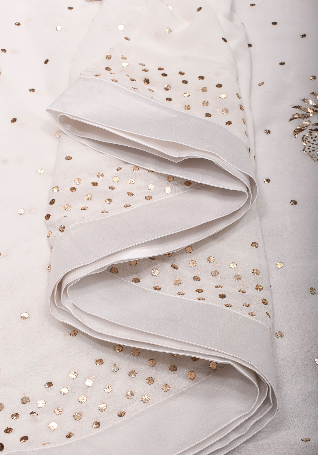 Exquisite and Authentic Hand Mukesh embellishments on White Pure Georgette Saree