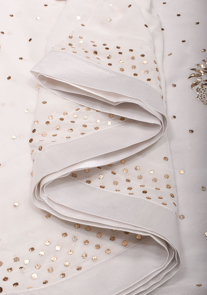 Exquisite and Authentic Hand Mukesh embellishments on White Pure Georgette Saree