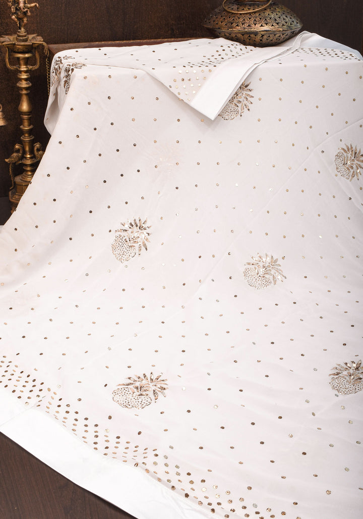 Exquisite and Authentic Hand Mukesh embellishments on White Pure Georgette Saree