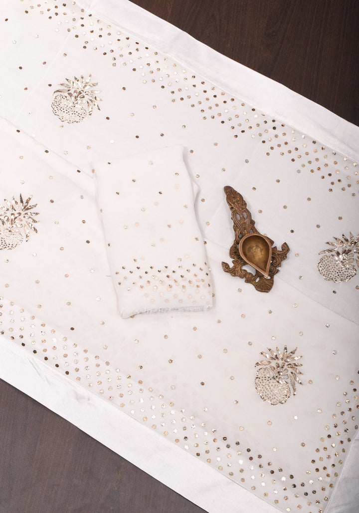Exquisite and Authentic Hand Mukesh embellishments on White Pure Georgette Saree