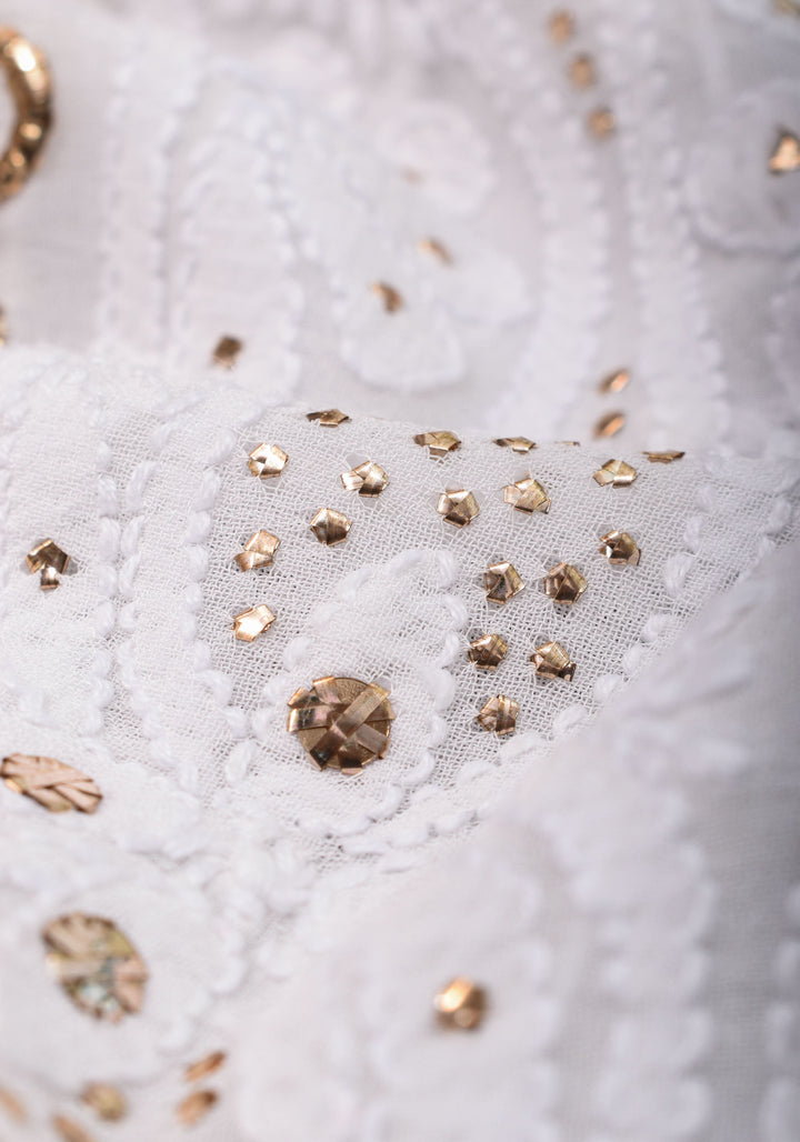 Exquisite and Authentic Hand Mukesh embellishments on White  Pure Georgette Sareeg work