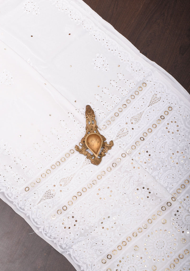 Exquisite and Authentic Hand Mukesh embellishments on White  Pure Georgette Sareeg work