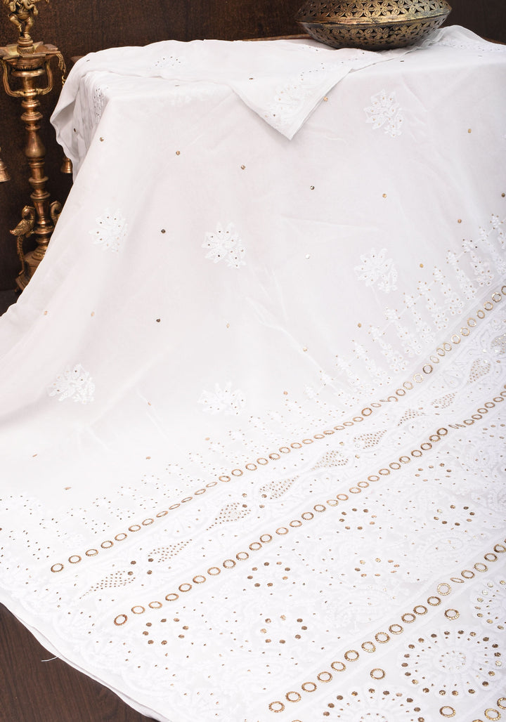 Exquisite and Authentic Hand Mukesh embellishments on White  Pure Georgette Sareeg work