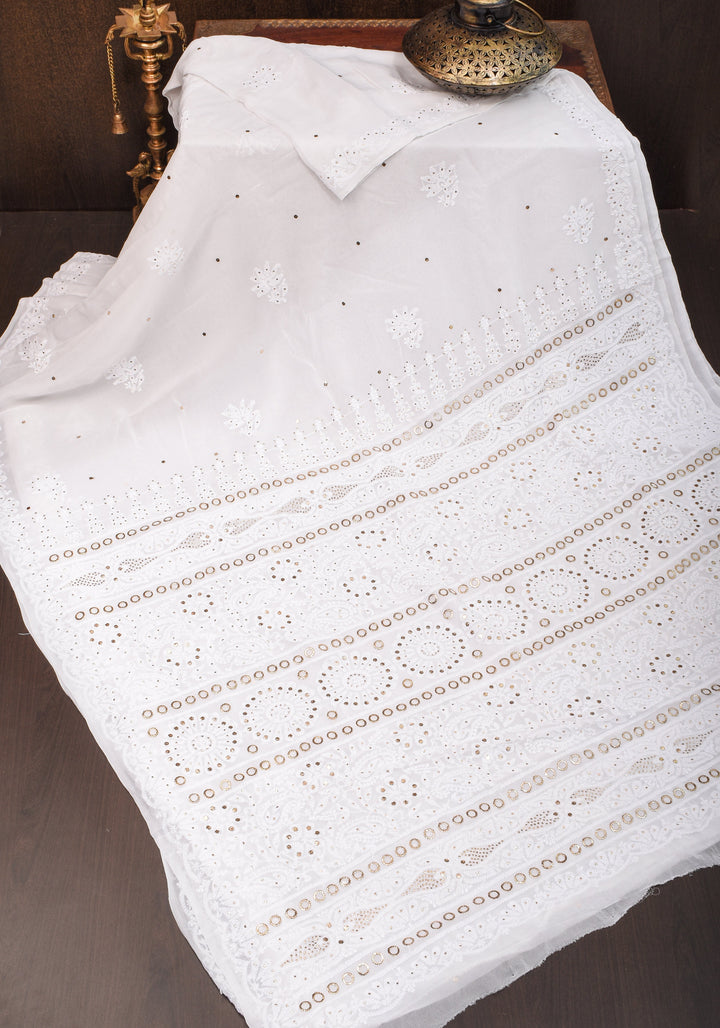 Exquisite and Authentic Hand Mukesh embellishments on White  Pure Georgette Sareeg work