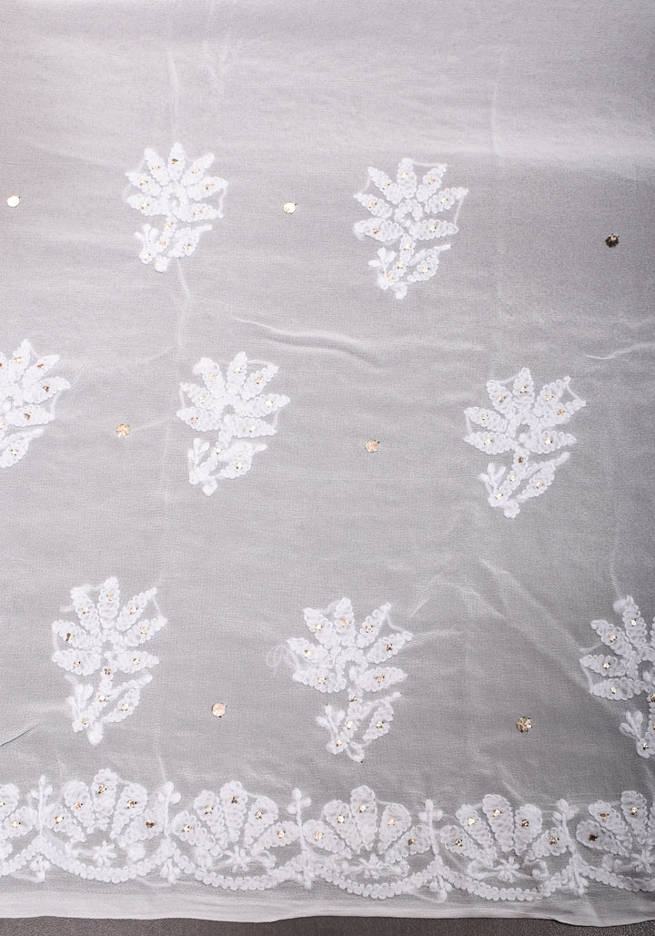Exquisite and Authentic Hand Mukesh embellishments on White  Pure Georgette Sareeg work