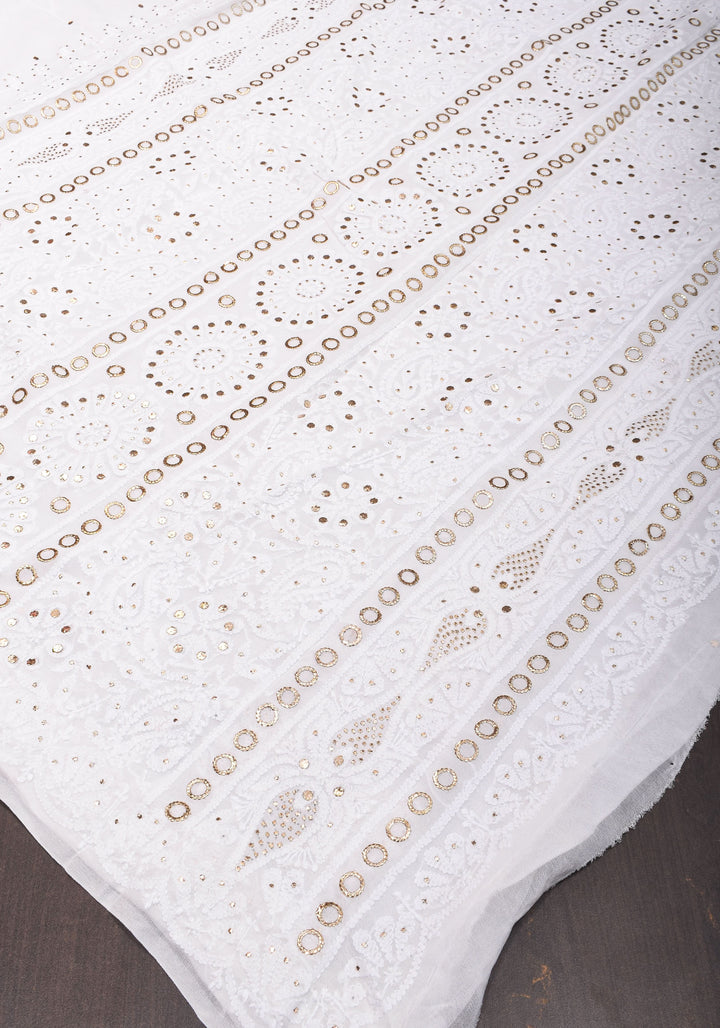 Exquisite and Authentic Hand Mukesh embellishments on White  Pure Georgette Sareeg work
