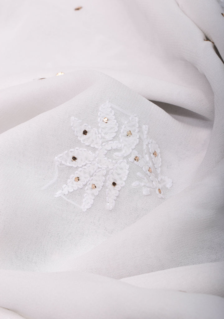 Exquisite and Authentic Hand Mukesh embellishments on White  Pure Georgette Sareeg work
