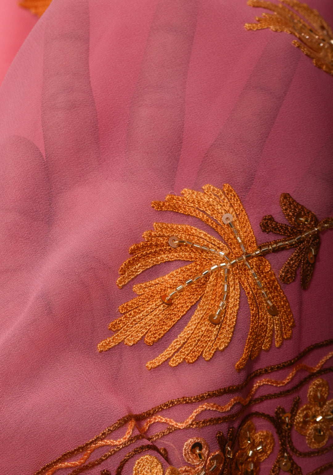 Exquisite Strawberry Pink Georgette Saree with Kashmiri Aari Work and cutdana work