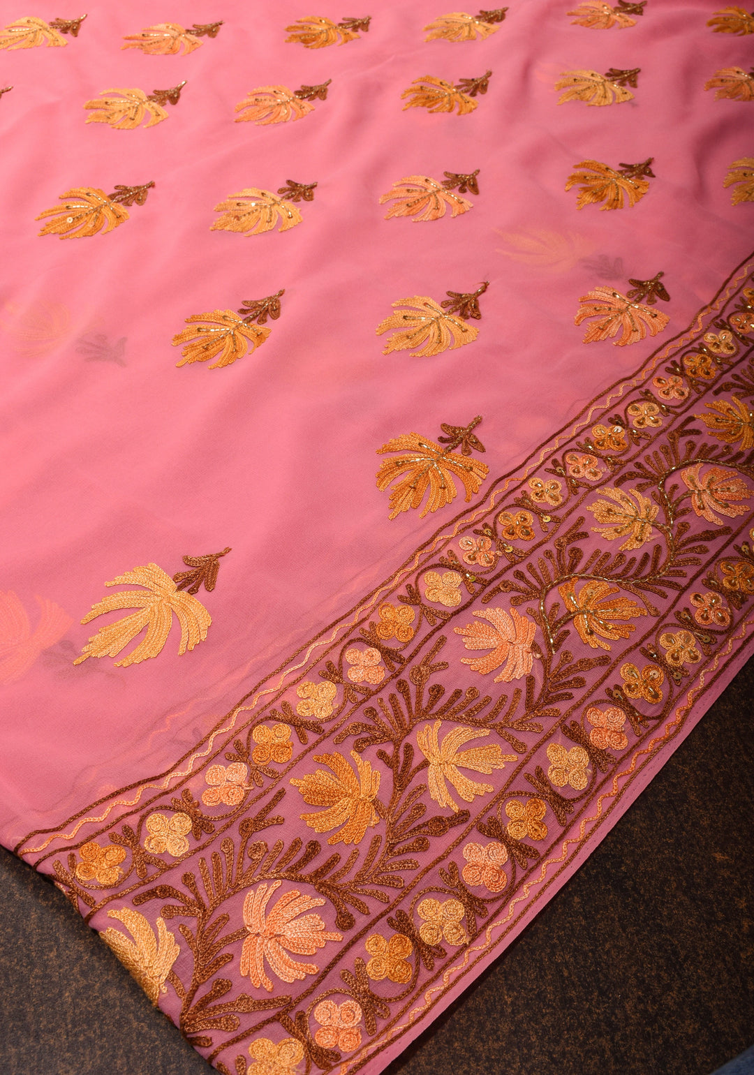 Exquisite Strawberry Pink Georgette Saree with Kashmiri Aari Work and cutdana work