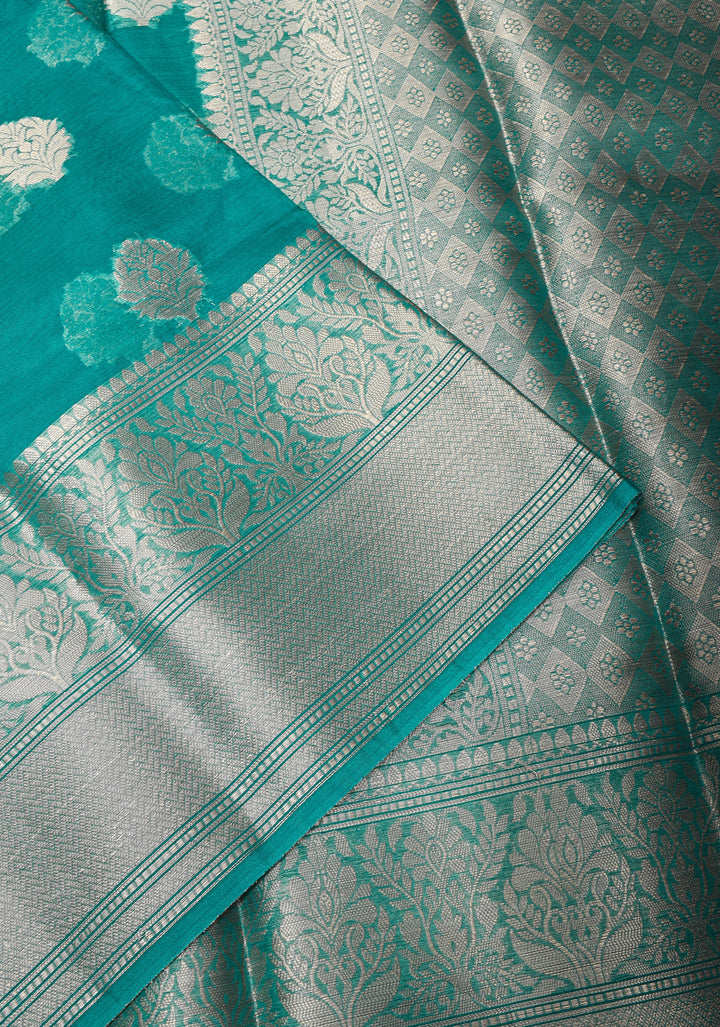 Unique Silver Zari butta Banarasi Semi Kora Silk Saree in Teal Blue with Silver tone zari