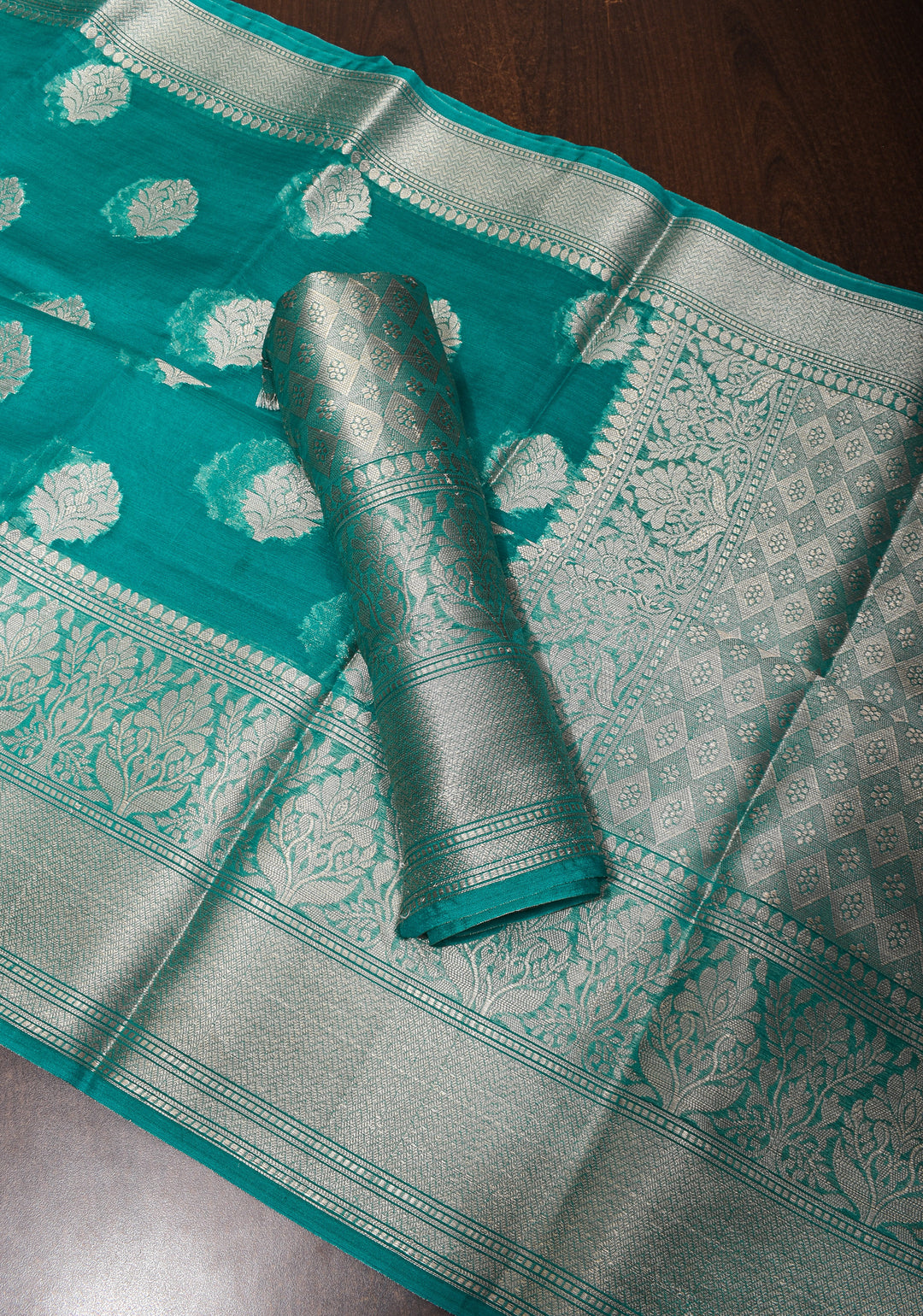 Unique Silver Zari butta Banarasi Semi Kora Silk Saree in Teal Blue with Silver tone zari