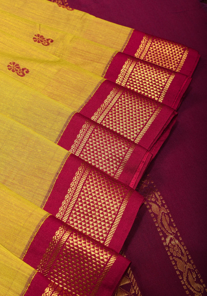Sulphur Yellow Cotton Silk Saree with Zari Buttas and Contrast Zari Border