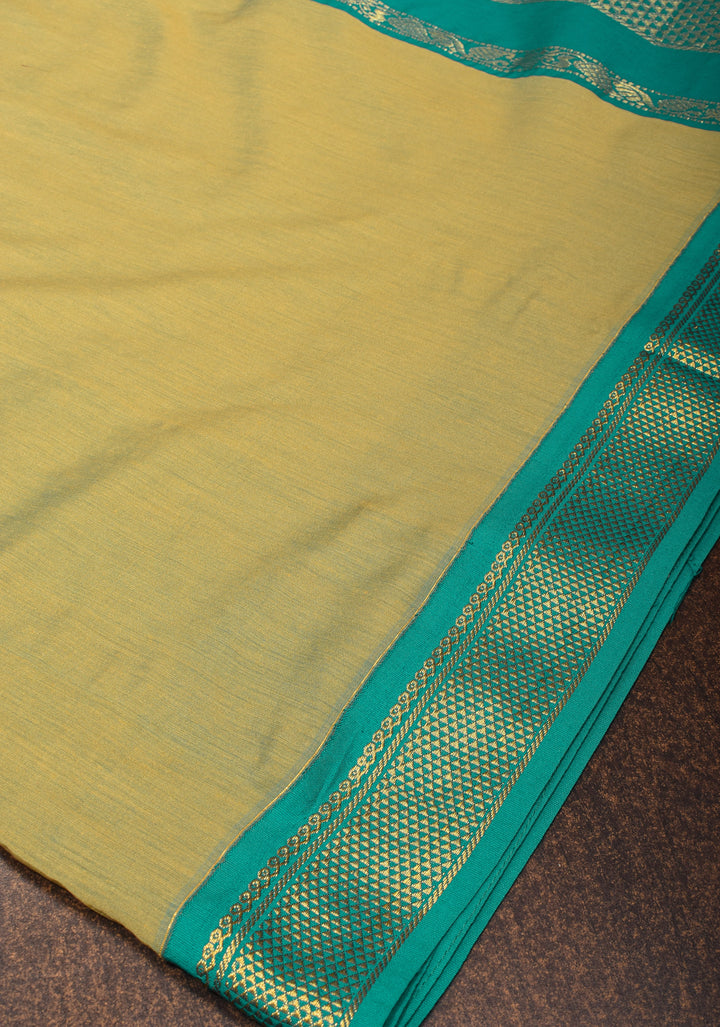 Elegant Tan Dual-Tone Silk Saree with Contrasting Teal Border