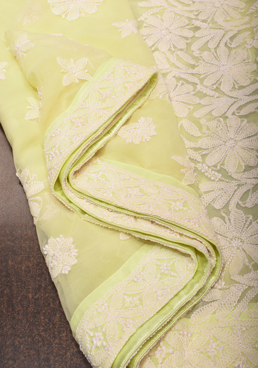 Hand Chikankari on pastel butter yellow with full body buttas and satin trim