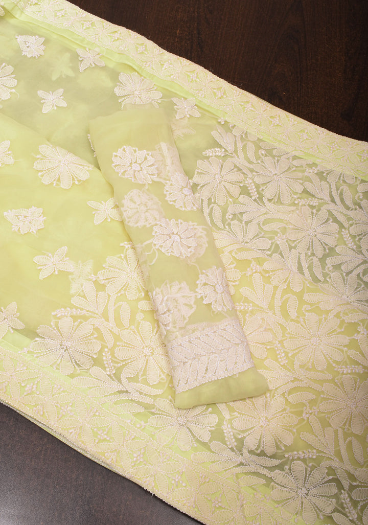 Hand Chikankari on pastel butter yellow with full body buttas and satin trim