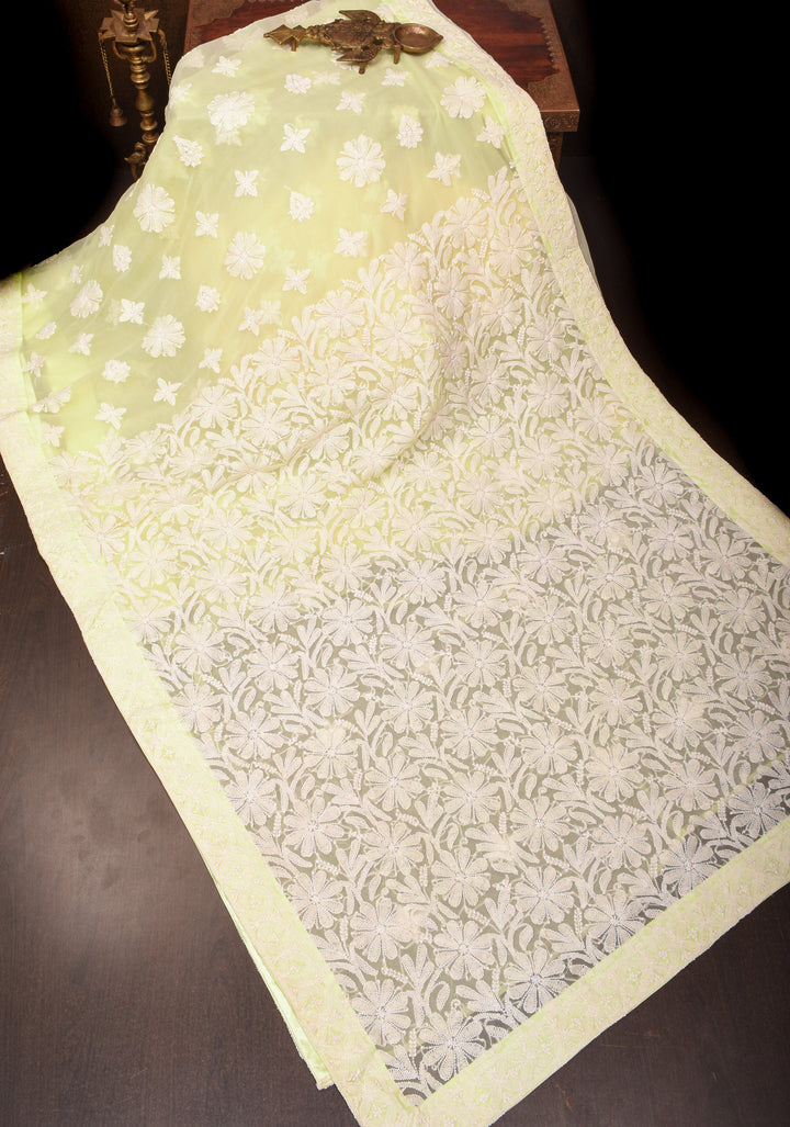 Hand Chikankari on pastel butter yellow with full body buttas and satin trim