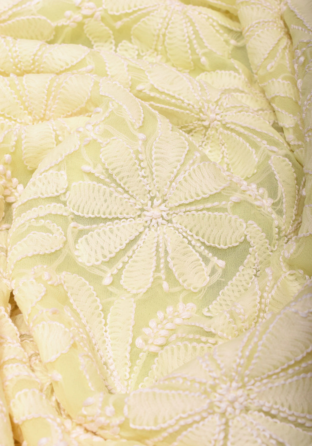 Hand Chikankari on pastel butter yellow with full body buttas and satin trim