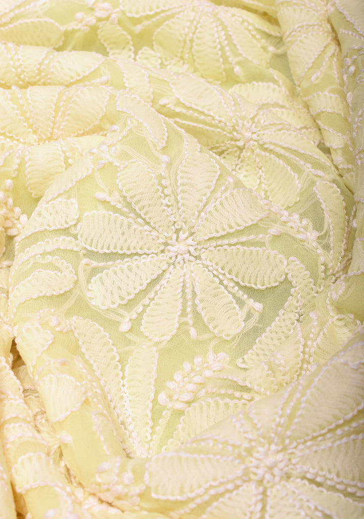 Hand Chikankari on pastel butter yellow with full body buttas and satin trim