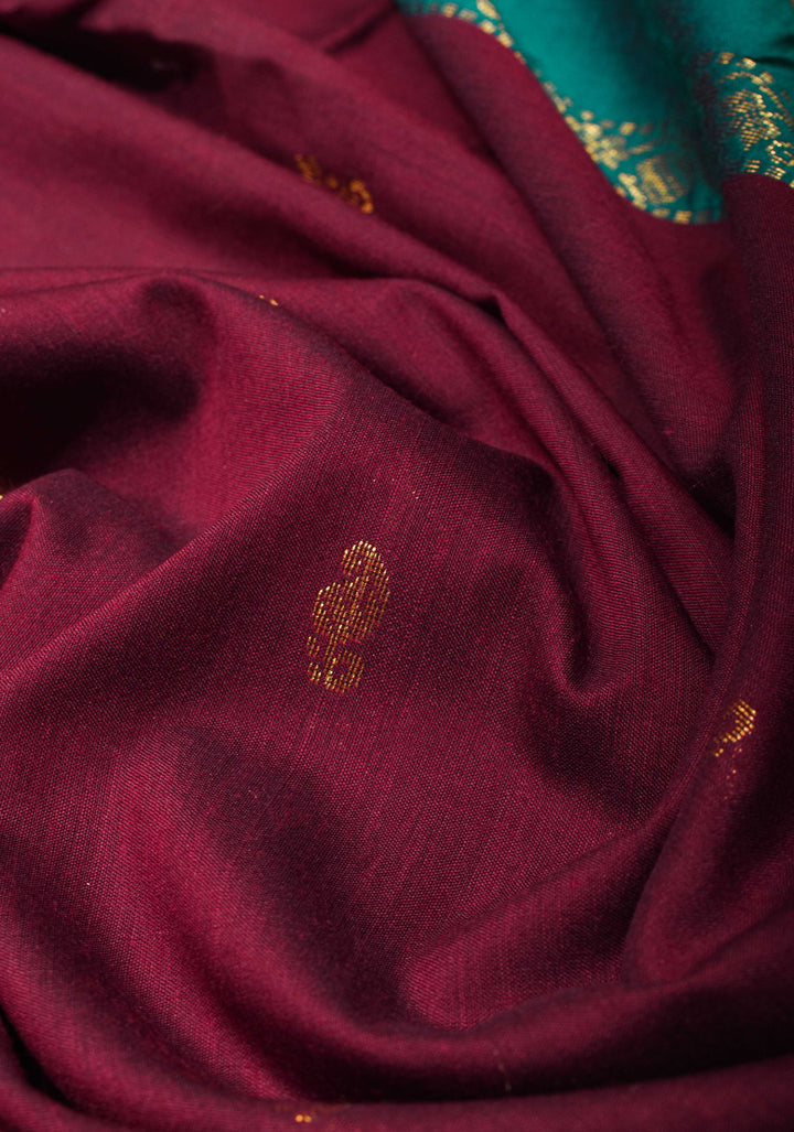 Maroon Cotton Silk Saree with Zari Buttas and  Contrast Teal Border