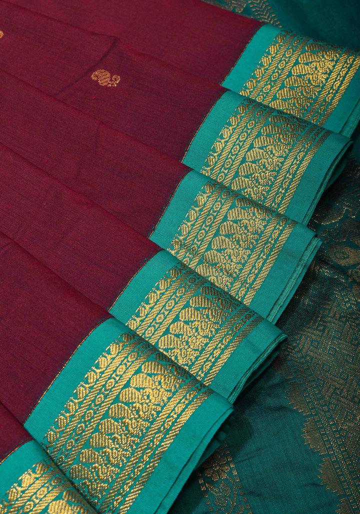 Maroon Cotton Silk Saree with Zari Buttas and  Contrast Teal Border